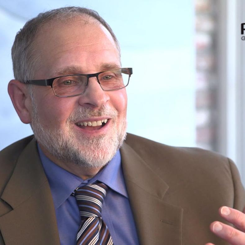 Dr. Ken Huskins