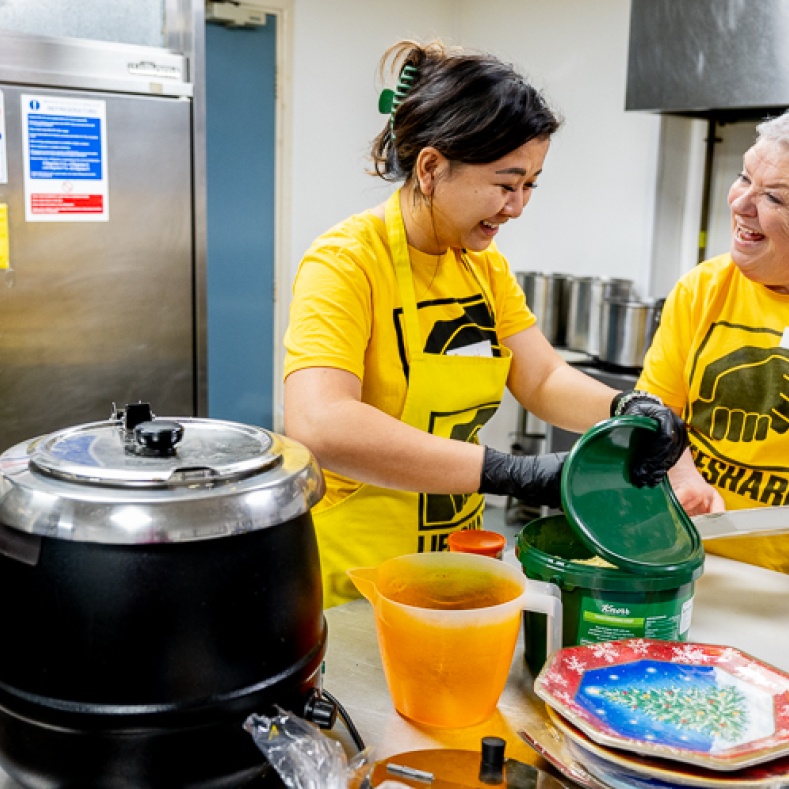 volunteers helping to prepare food