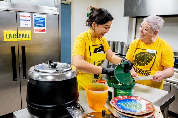 volunteers helping to prepare food