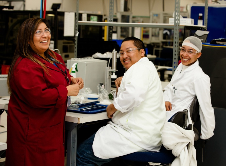 Lab workers smiling