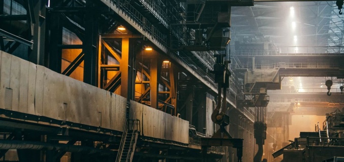 Image of a factory with cranes