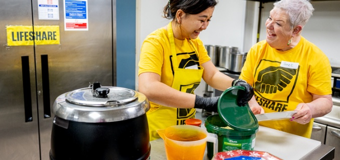 volunteers helping to prepare food